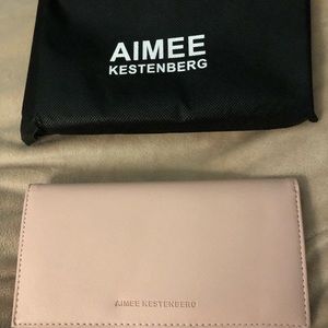 One brand new Amiee Kestenberg bifold wallet